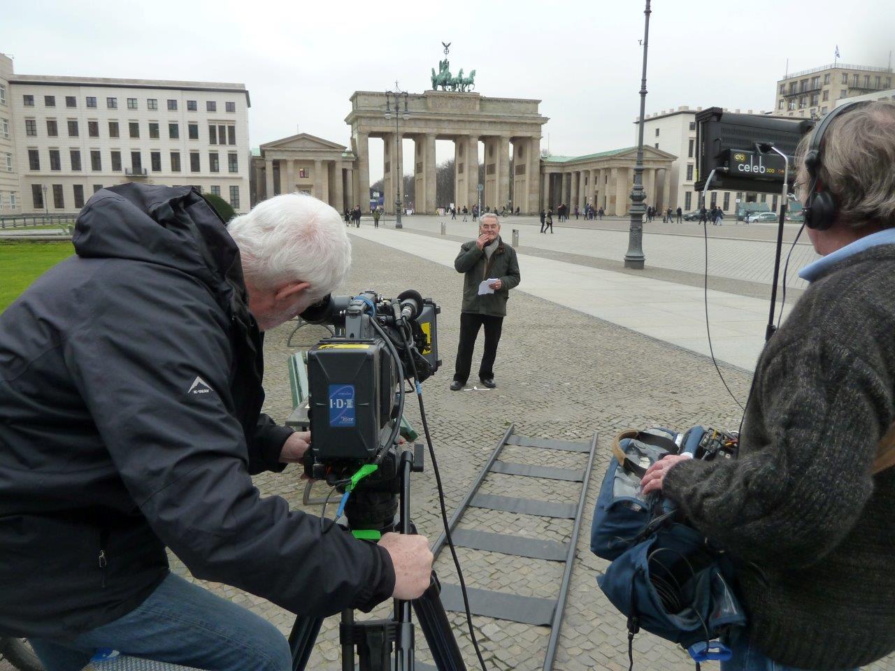 Tomi Reichental being interviewed at Berlin's famous Brandenburg Gate for the Praxis Pictures documentary "Close to Evil".